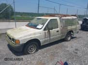 ✅ 1992 Isuzu Pickup S • VIN: 4S1CL11L3N4207154 • Lot: 42470949. Wystawiony na IAAI z przebiegiem 309 488 mil. Bezpłatny archiwum sprzedaży aukcyjnych z USA i szczegółowy raport historii pojazdu na DreamBid. Zdjęcie 2.