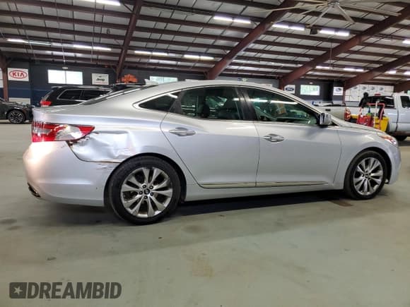 ✅ 2012 Hyundai Azera • VIN: KMHFG4JGXCA125557 • Лот: 80189105. Опубликован ранее на Copart с пробегом 134 948 миль. Бесплатный доступ к архиву аукционных продаж из США и подробный отчёт об истории автомобиля на DreamBid. Изображение 3.