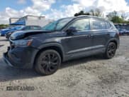 ✅ 2024 Volkswagen Taos SE • VIN: 3VVEX7B21RM017636 • Lot: 84216985. Listed on Copart with 31,367 mi. Free auction sales archive from the USA and detailed vehicle history report at DreamBid. Image 1.