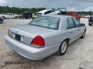 ✅ 2000 Ford Crown Victoria LX • VIN: 2FAFP74W1YX168424 • Лот: 42819181. Опубликован ранее на IAAI с пробегом 135 701 миль. Бесплатный доступ к архиву аукционных продаж из США и подробный отчёт об истории автомобиля на DreamBid. Изображение 4.