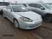 2008 Hyundai Tiburon GS z VIN KMHHM66D08U268552, wystawiony jako IAAI lot #41729193 z przebiegiem 88 939 mil mil oraz . Historia ofert i sprzedaży dostępna na DreamBid. Obrazek 1.