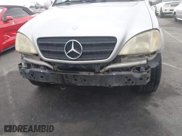 ✅ 1999 Mercedes-Benz M 320/430/500 • VIN: 4JGAB72E8XA051536 • Lot: 43200830. Listed on IAAI with 128,244 mi. Free auction sales archive from the USA and detailed vehicle history report at DreamBid. Image 6.