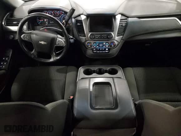 2017 Chevrolet Suburban LS z VIN 1GNSKGEC9HR202025, wystawiony jako Copart lot #83037604 z przebiegiem Nie podano mil oraz Szkoda całkowita • Salvage title. Historia ofert i sprzedaży dostępna na DreamBid. Obrazek 8.