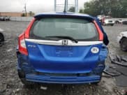 ✅ 2018 Honda Fit EX-L • VIN: 3HGGK5H06JM702320 • Лот: 66926535. Опубликован ранее на Copart с пробегом 67 999 миль. Бесплатный доступ к архиву аукционных продаж из США и подробный отчёт об истории автомобиля на DreamBid. Изображение 6.