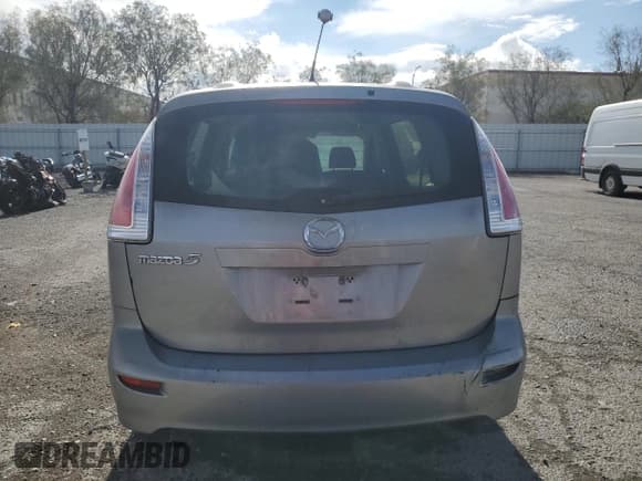 ✅ 2010 Mazda 5 Touring • VIN: JM1CR2W35A0382981 • Лот: 92050545. Опубликован ранее на Copart с пробегом 126 939 миль. Бесплатный доступ к архиву аукционных продаж из США и подробный отчёт об истории автомобиля на DreamBid. Изображение 6.