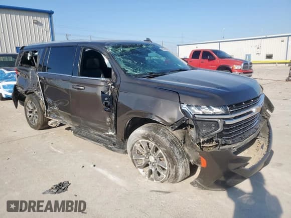 ✅ 2021 Chevrolet Suburban LT • VIN: 1GNSCCKD4MR174227 • Lot: 82164525. Listed on Copart with 99,717 mi. Free auction sales archive from the USA and detailed vehicle history report at DreamBid. Image 4.