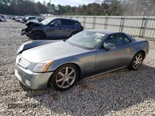 ✅ 2004 Cadillac XLR • VIN: 1G6YV34A845603654 • Lot: 83494824. Wystawiony na Copart z przebiegiem 89 609 mil. Bezpłatny archiwum sprzedaży aukcyjnych z USA i szczegółowy raport historii pojazdu na DreamBid. Zdjęcie 1.