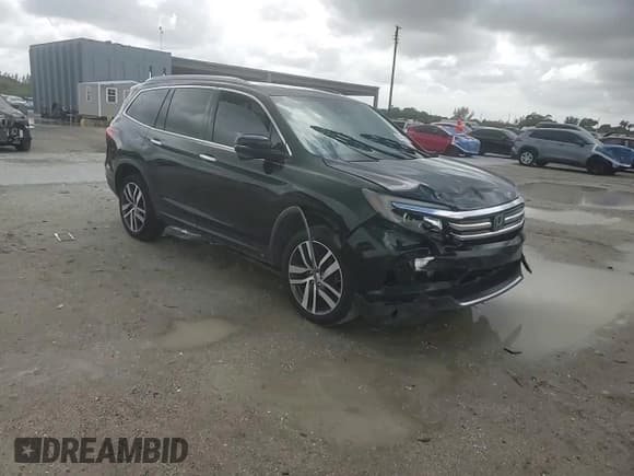 ✅ 2017 Honda Pilot Touring • VIN: 5FNYF6H96HB092090 • Лот: 85154595. Опубликован ранее на Copart с пробегом Не указан. Бесплатный доступ к архиву аукционных продаж из США и подробный отчёт об истории автомобиля на DreamBid. Изображение 14.