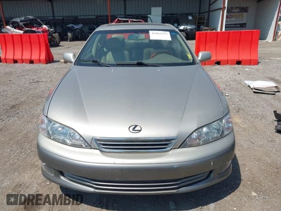 ✅ 2000 Lexus ES 300 • VIN: JT8BF28G7Y0285648 • Lot: 42963535. Listed on IAAI with 157,356 mi. Free auction sales archive from the USA and detailed vehicle history report at DreamBid. Image 6.