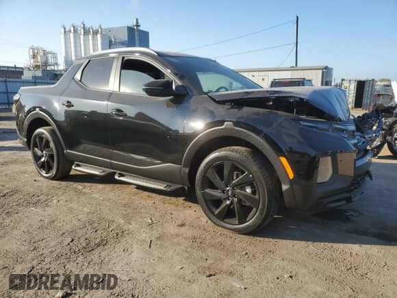 2024 Hyundai Santa Cruz Night Edition с VIN 5NTJCDDF7RH102110, выставлен на аукционе Copart как лот 75322214 с пробегом Не указан миль и Списание • Salvage title. История ставок и продаж доступна на DreamBid. Изображение 4.