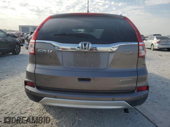 ✅ 2016 Honda CR-V Touring • VIN: 5J6RM3H95GL028962 • Lot: 75066344. Listed on Copart with 26,506 mi. Free auction sales archive from the USA and detailed vehicle history report at DreamBid. Image 6.