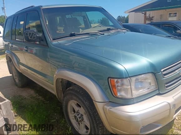 ✅ 2002 Isuzu Trooper S • VIN: JACDJ58X727J09867 • Lot: 42590444. Listed on IAAI with 152,172 mi. Free auction sales archive from the USA and detailed vehicle history report at DreamBid. Image 1.