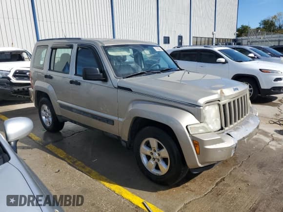 ✅ 2011 Jeep Liberty Sport Jet • VIN: 1J4PN2GK8BW565450 • Lot: 87082815. Listed on Copart with 159,381 mi. Free auction sales archive from the USA and detailed vehicle history report at DreamBid. Image 4.