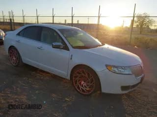 ✅ 2012 Lincoln MKZ • VIN: 3LNHL2GC9CR802875 • Lot: 43655237. Wystawiony na IAAI z przebiegiem 174 442 mil. Bezpłatny archiwum sprzedaży aukcyjnych z USA i szczegółowy raport historii pojazdu na DreamBid. Zdjęcie 1.