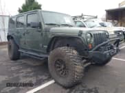 ✅ 2008 Jeep Wrangler Unlimited Rubicon • VIN: 1J8GA69168L591089 • Lot: 41487746. Listed on IAAI with 161,916 mi. Free auction sales archive from the USA and detailed vehicle history report at DreamBid. Image 1.