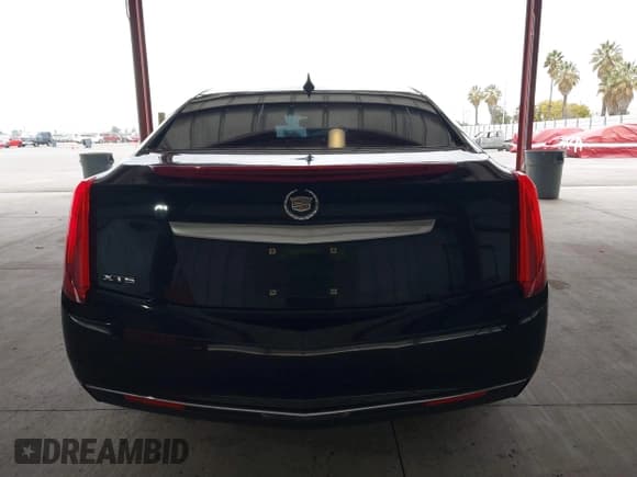 ✅ 2013 Cadillac XTS Livery • VIN: 2G61W5S33D9164395 • Lot: 41793791. Listed on IAAI with 421,499 mi. Free auction sales archive from the USA and detailed vehicle history report at DreamBid. Image 16.