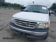 ✅ 2002 Ford F-150 XL • VIN: 1FTRX17L32NA19687 • Lot: 42577258. Listed on IAAI with 216,685 mi. Free auction sales archive from the USA and detailed vehicle history report at DreamBid. Image 6.