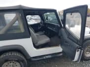 ✅ 1991 Jeep Wrangler • VIN: 2J4FY19P5MJ118851 • Lot: 43577144. Listed on IAAI with 156,132 mi. Free auction sales archive from the USA and detailed vehicle history report at DreamBid. Image 5.