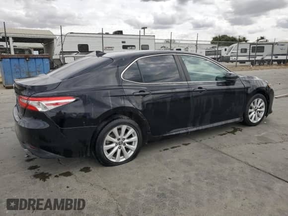 2019 Toyota Camry LE с VIN 4T1B11HK1KU250470, выставлен на аукционе Copart как лот 71716865 с пробегом 132 733 миль миль и Чистый • Clean title. История ставок и продаж доступна на DreamBid. Изображение 3.
