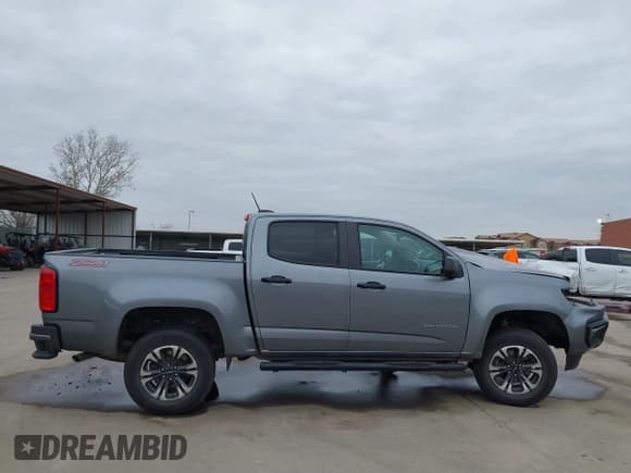 ✅ 2021 Chevrolet Colorado 2WD Z71 • VIN: 1GCGSDEN5M1123300 • Лот: 41441570. Опубликован ранее на IAAI с пробегом 89 859 миль. Бесплатный доступ к архиву аукционных продаж из США и подробный отчёт об истории автомобиля на DreamBid. Изображение 14.