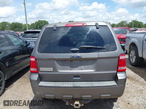 ✅ 2012 Ford Escape XLS • VIN: 1FMCU9C79CKC56110 • Lot: 42618886. Listed on IAAI with 189,520 mi. Free auction sales archive from the USA and detailed vehicle history report at DreamBid. Image 16.