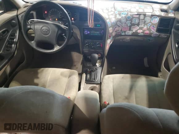 2003 Hyundai Elantra GLS z VIN KMHDN45D83U495806, wystawiony jako Copart lot #65962504 z przebiegiem 131 056 mil mil oraz Szkoda całkowita • Salvage title. Historia ofert i sprzedaży dostępna na DreamBid. Obrazek 8.