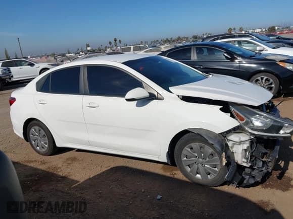 ✅ 2020 Kia Rio S • VIN: 3KPA24AD4LE258766 • Lot: 43026853. Listed on IAAI with 93,957 mi. Free auction sales archive from the USA and detailed vehicle history report at DreamBid. Image 14.