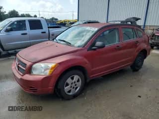 2007 Dodge Caliber with VIN 1B3JB28B97D503059, listed as a Copart auction lot 67860335 with 169,452 mi miles and Salvage title. Bid and sale history available at DreamBid. Image 1.