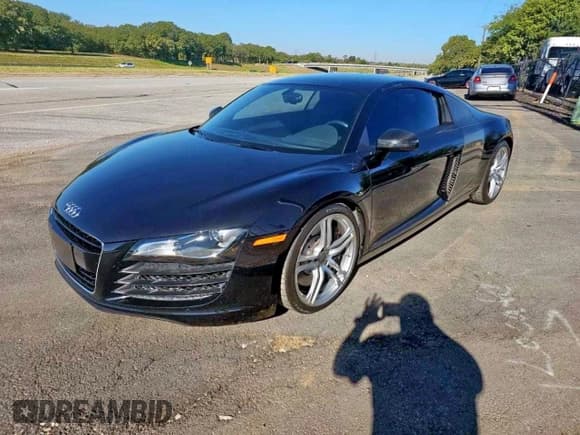 ✅ 2012 Audi R8 V8 • VIN: WUADUAFG1CN002818 • Лот: 93748625. Опубликован ранее на Copart с пробегом 29 870 миль. Бесплатный доступ к архиву аукционных продаж из США и подробный отчёт об истории автомобиля на DreamBid. Изображение 2.