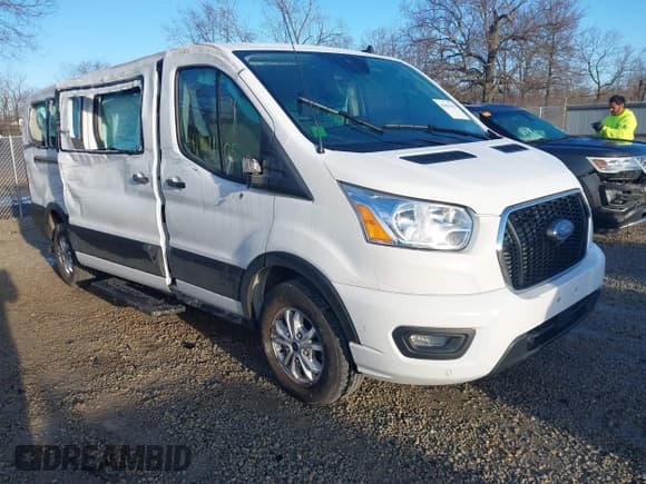 ✅ 2021 Ford Transit Passenger XL • VIN: 1FBAX2Y81MKA14882 • Лот: 41861105. Опубликован ранее на IAAI с пробегом 71 457 миль. Бесплатный доступ к архиву аукционных продаж из США и подробный отчёт об истории автомобиля на DreamBid. Изображение 1.