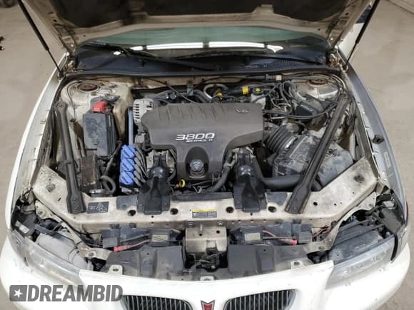 ✅ 2002 Pontiac Grand Prix GT • VIN: 1G2WP12K52F262028 • Лот: 70868895. Опубликован ранее на Copart с пробегом 323 648 миль. Бесплатный доступ к архиву аукционных продаж из США и подробный отчёт об истории автомобиля на DreamBid. Изображение 11.