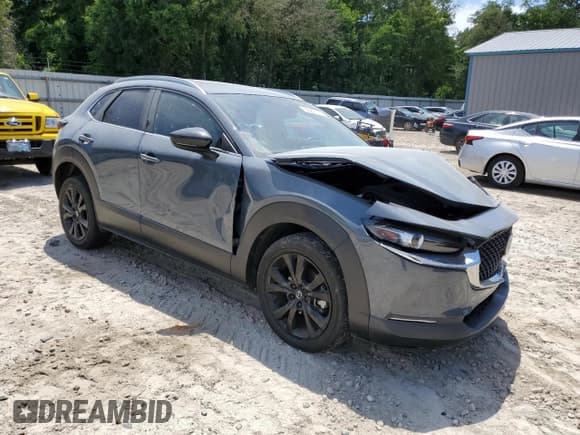 ✅ 2022 Mazda CX-30 S Carbon Edition • VIN: 3MVDMBCL0NM434395 • Lot: 56247715. Listed on Copart with 40,698 mi. Free auction sales archive from the USA and detailed vehicle history report at DreamBid. Image 4.