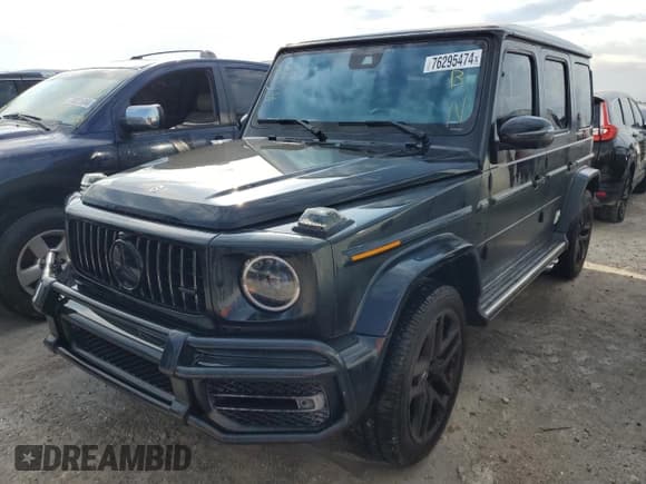 ✅ 2023 Mercedes-Benz G 63 AMG • VIN: W1NYC7HJ7PX464185 • Lot: 76295474. Listed on Copart with 11,468 mi. Free auction sales archive from the USA and detailed vehicle history report at DreamBid. Image 1.