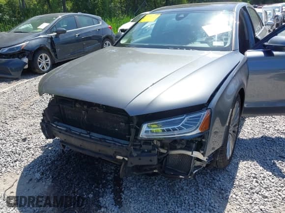 ✅ 2015 Audi A8 4.0T • VIN: WAU32AFD6FN024626 • Lot: 42978163. Wystawiony na IAAI z przebiegiem 143 595 mil. Bezpłatny archiwum sprzedaży aukcyjnych z USA i szczegółowy raport historii pojazdu na DreamBid. Zdjęcie 6.