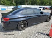 ✅ 2016 BMW M5 • VIN: WBSFV9C55GD595799 • Лот: 65708864. Опубликован ранее на Copart с пробегом 104 198 миль. Бесплатный доступ к архиву аукционных продаж из США и подробный отчёт об истории автомобиля на DreamBid. Изображение 3.