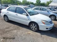 ✅ 2006 Mitsubishi Lancer ES • VIN: JA3AJ26E16U062703 • Лот: 42244328. Опубликован ранее на IAAI с пробегом 93 950 миль. Бесплатный доступ к архиву аукционных продаж из США и подробный отчёт об истории автомобиля на DreamBid. Изображение 1.