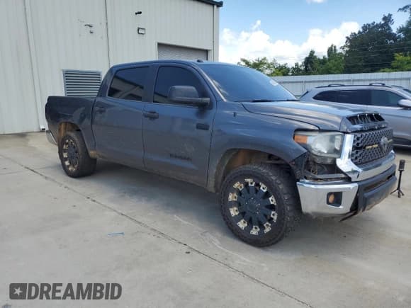 ✅ 2018 Toyota Tundra SR5 • VIN: 5TFDW5F15JX696604 • Lot: 64248225. Listed on Copart with 128,793 mi. Free auction sales archive from the USA and detailed vehicle history report at DreamBid. Image 4.
