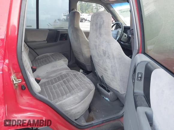 ✅ 1995 Jeep Grand Cherokee Laredo • VIN: 1J4GZ58Y6SC500767 • Lot: 43545818. Listed on IAAI with 198,879 mi. Free auction sales archive from the USA and detailed vehicle history report at DreamBid. Image 8.