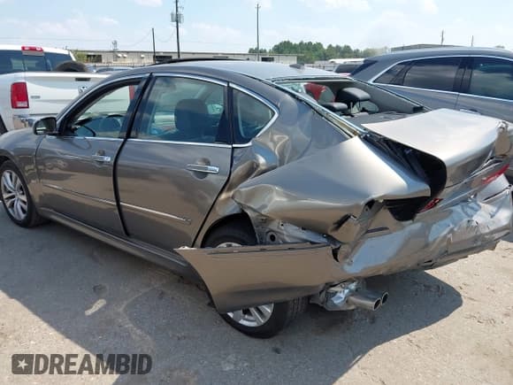 ✅ 2008 Infiniti M • VIN: JNKAY01EX8M605332 • Lot: 43343454. Listed on IAAI with 127,649 mi. Free auction sales archive from the USA and detailed vehicle history report at DreamBid. Image 3.