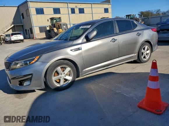 ✅ 2015 Kia Optima LX • VIN: 5XXGM4A77FG466439 • Lot: 94572025. Listed on Copart with 128,472 mi. Free auction sales archive from the USA and detailed vehicle history report at DreamBid. Image 1.