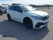 ✅ 2023 Volkswagen Tiguan SE R-Line Black • VIN: 3VVCB7AX0PM090710 • Lot: 41256904. Wystawiony na IAAI z przebiegiem 12 819 mil. Bezpłatny archiwum sprzedaży aukcyjnych z USA i szczegółowy raport historii pojazdu na DreamBid. Zdjęcie 1.