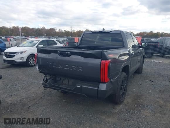✅ 2024 Toyota Tundra SR5 • VIN: 5TFLA5DB5RX210214 • Lot: 43510283. Listed on IAAI with 62,426 mi. Free auction sales archive from the USA and detailed vehicle history report at DreamBid. Image 4.