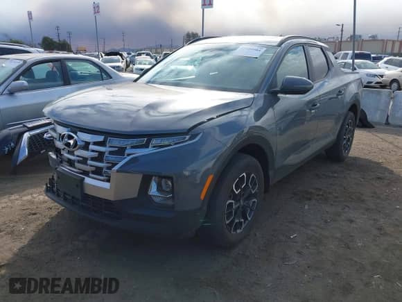 2023 Hyundai Santa Cruz SEL z VIN 5NTJC4AE5PH071917, wystawiony jako IAAI lot #41249984 z przebiegiem 14 703 mil mil oraz . Historia ofert i sprzedaży dostępna na DreamBid. Obrazek 17.