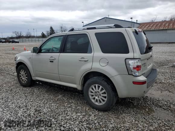 2009 Mercury Mariner Premier with VIN 4M2CU97789KJ11559, listed as a Copart auction lot 50976635 with 152,481 mi miles and Salvage title. Bid and sale history available at DreamBid. Image 2.