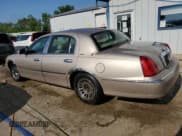 ✅ 1998 Lincoln Town Car Signature • VIN: 1LNFM82W7WY614094 • Lot: 59792735. Listed on Copart with 183,045 mi. Free auction sales archive from the USA and detailed vehicle history report at DreamBid. Image 2.