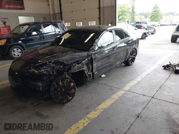 ✅ 2022 Cadillac CT4-V • VIN: 1G6DH5RL0N0125224 • Lot: 43332706. Listed on IAAI with 38,176 mi. Free auction sales archive from the USA and detailed vehicle history report at DreamBid. Image 18.