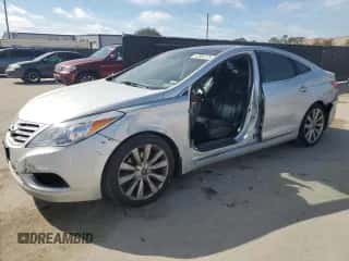 2014 Hyundai Azera Limited с VIN KMHFH4JG0EA353390, выставлен на аукционе Copart как лот 42502275 с пробегом 105 868 миль миль и Списание • Salvage title. История ставок и продаж доступна на DreamBid. Изображение 1.