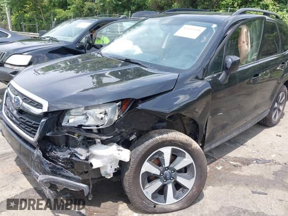 2017 Subaru Forester Limited with VIN JF2SJAJC7HH504600, listed as a IAAI auction lot 42492890 with 130,925 mi miles and . Bid and sale history available at DreamBid. Image 6.