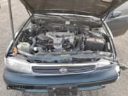 ✅ 1994 Nissan Maxima GXE • VIN: JN1HJ01F3RT244047 • Lot: 80753325. Wystawiony na Copart z przebiegiem 121 399 mil. Bezpłatny archiwum sprzedaży aukcyjnych z USA i szczegółowy raport historii pojazdu na DreamBid. Zdjęcie 11.