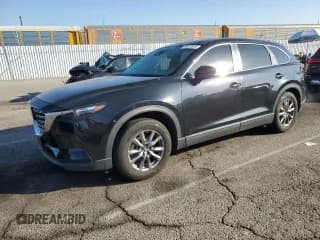 ✅ 2018 Mazda CX-9 Sport • VIN: JM3TCABYXJ0203838 • Lot: 89510545. Listed on Copart with 66,628 mi. Free auction sales archive from the USA and detailed vehicle history report at DreamBid. Image 1.